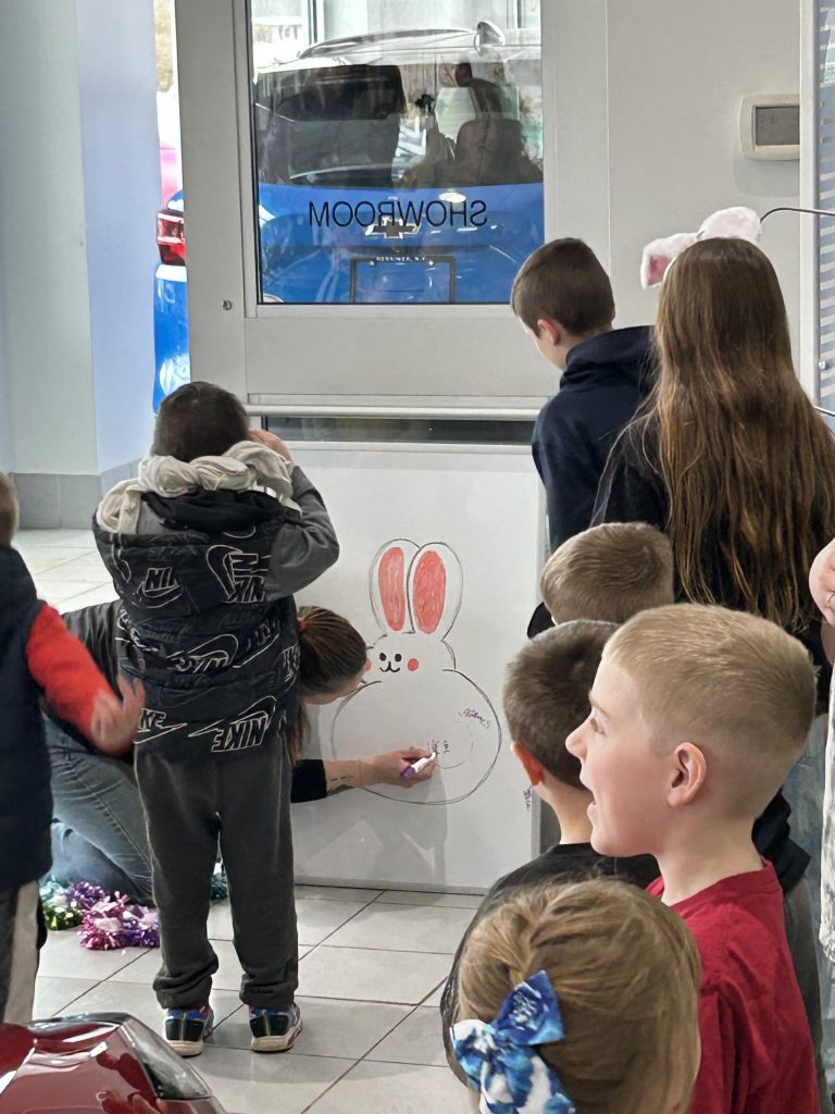 Bunny's Meadow Event at Steet Ponte Chevy in Herkimer, Kids Playing Pin the Tail on the Bunny
