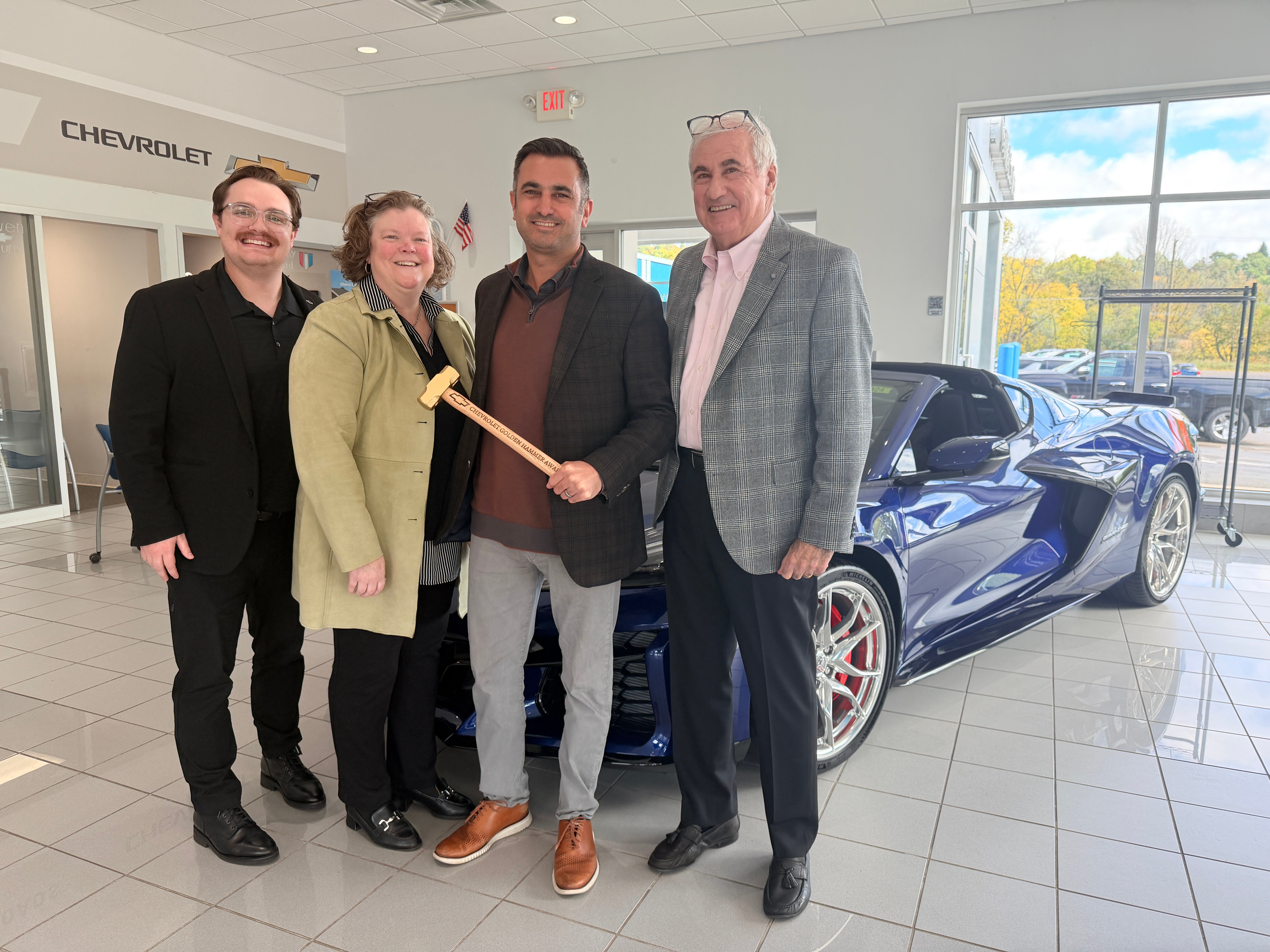 Steet Ponte Chevy Receiving Golden Hammer from GM/Chevy Representatives